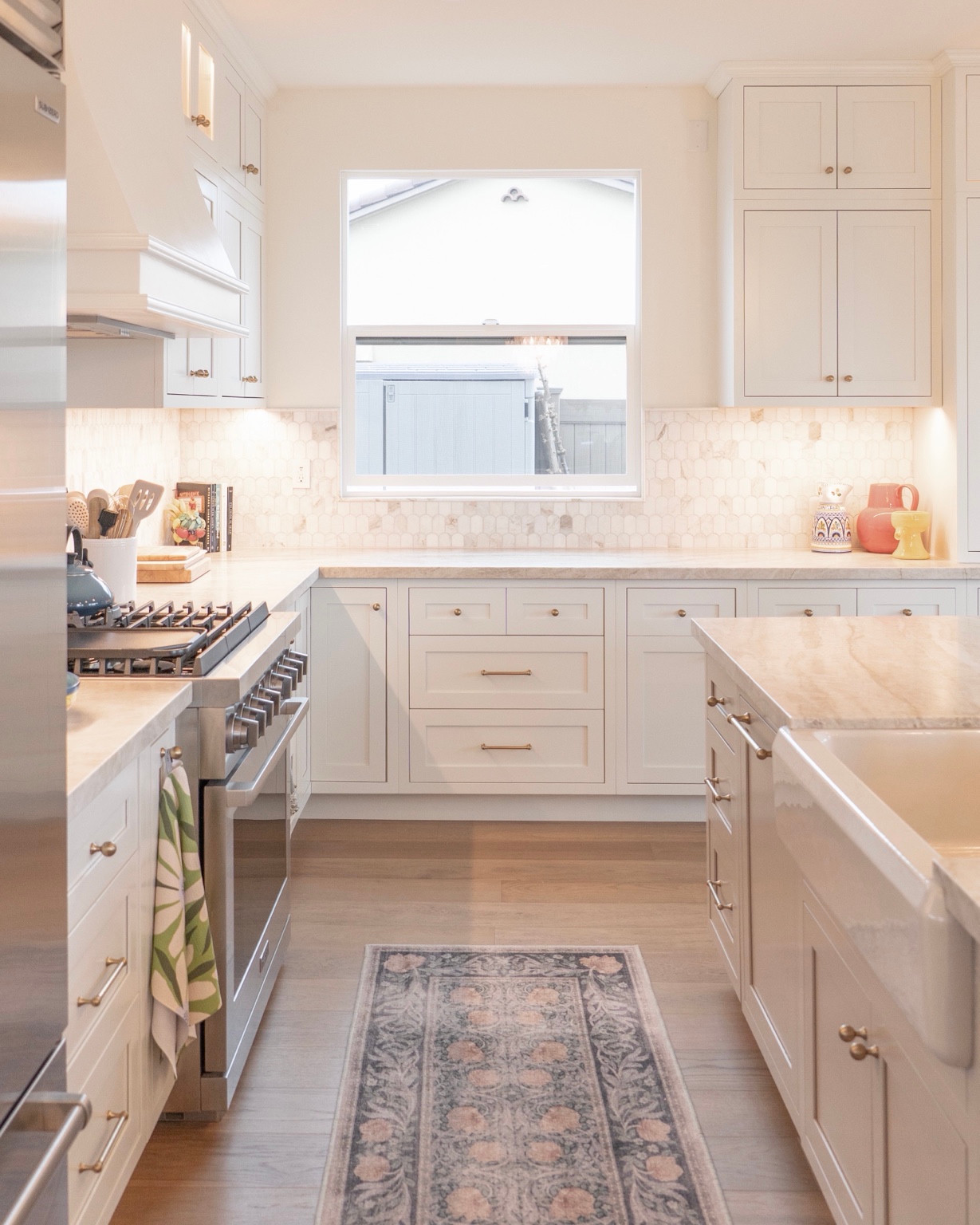 Ceiling-height cabinetry and the kitchen window wall