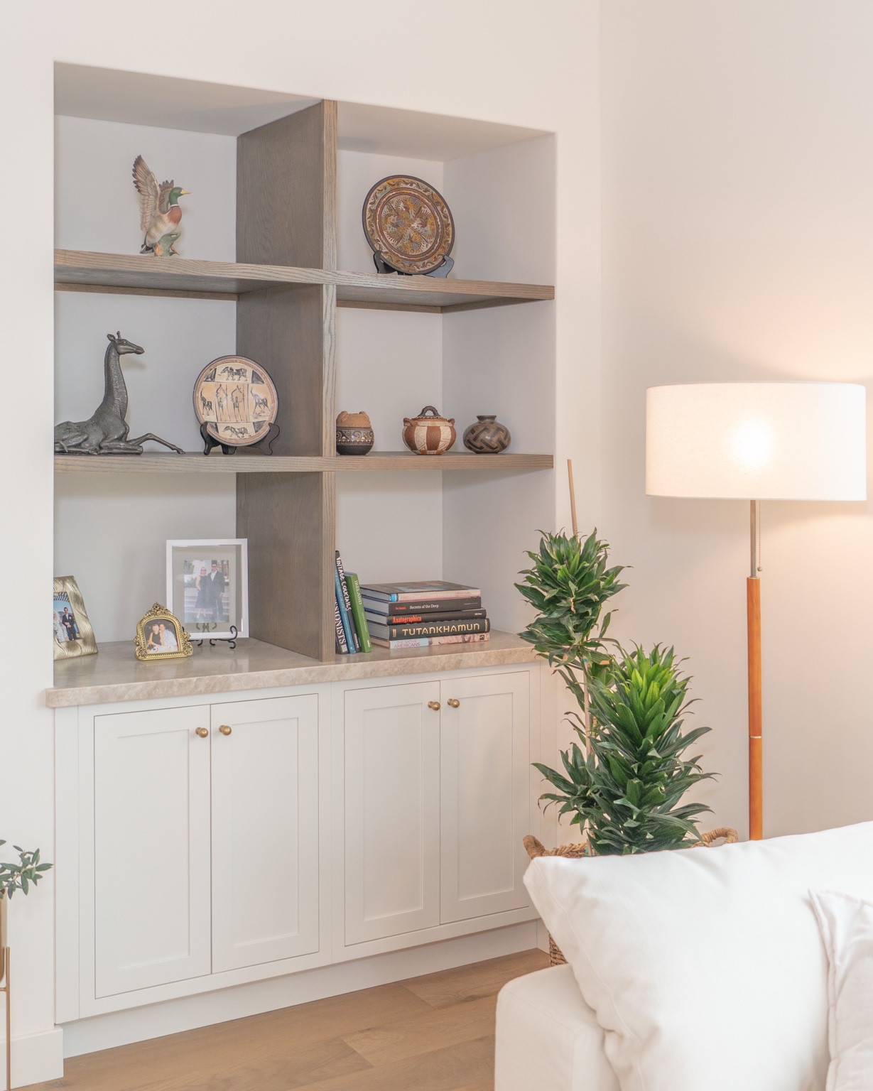 Home office built-ins with open display and closed storage